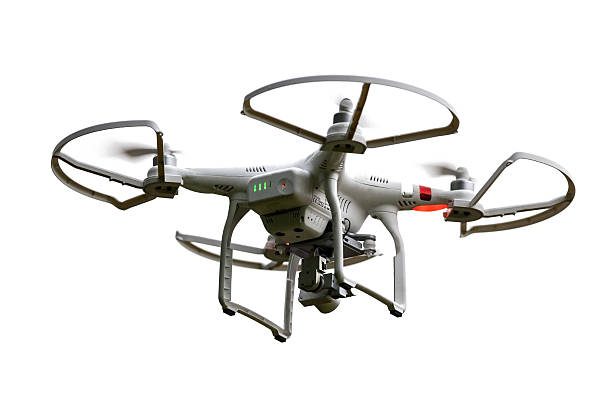 A white quadcopter drone with four propellers and a camera mounted underneath.