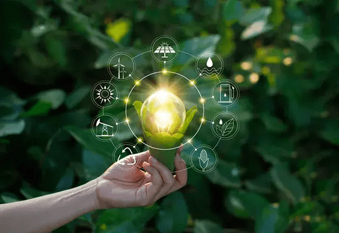 Hand holding a glowing green plant bulb with environmental icons around.